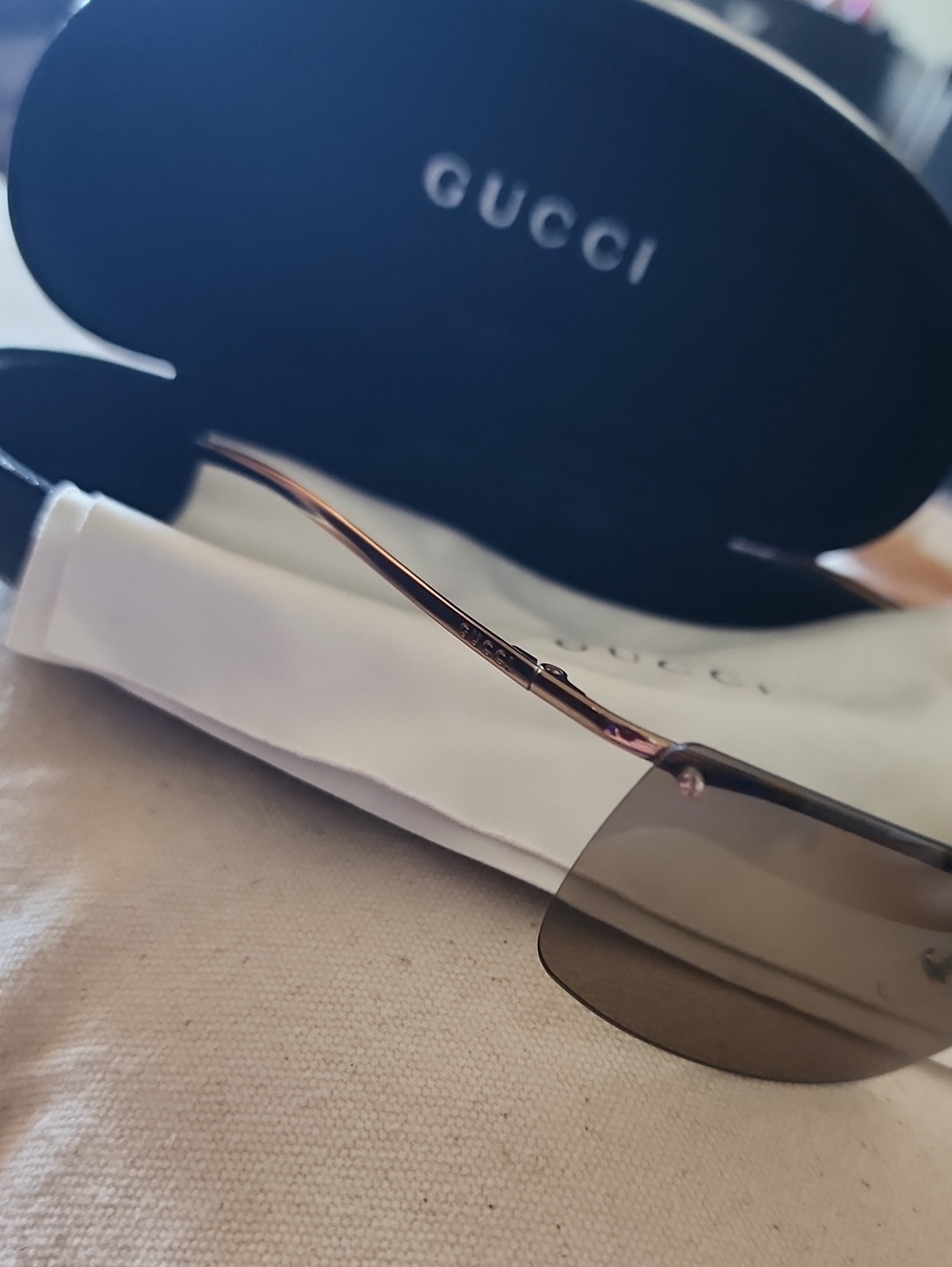 Gucci Men’s Rimless Sunglasses in Brown and Gold